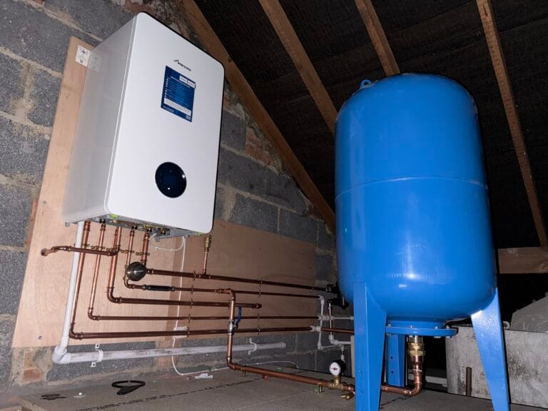 Worcester Bosch combi boiler with a Zilmet accumulator installed to provide higher water pressure