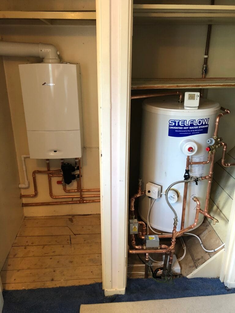 Worcester Bosch boiler and Stelflow unvented hot water cylinder installed with copper pipework